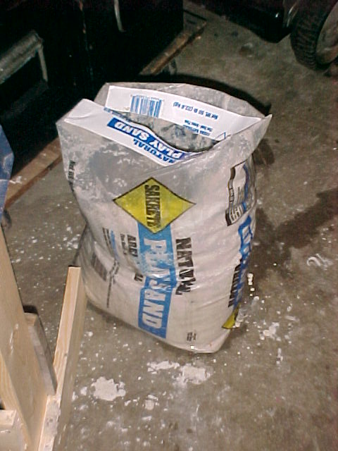 I use 50 lb bags of PlaySand from Home Depot.jpg
